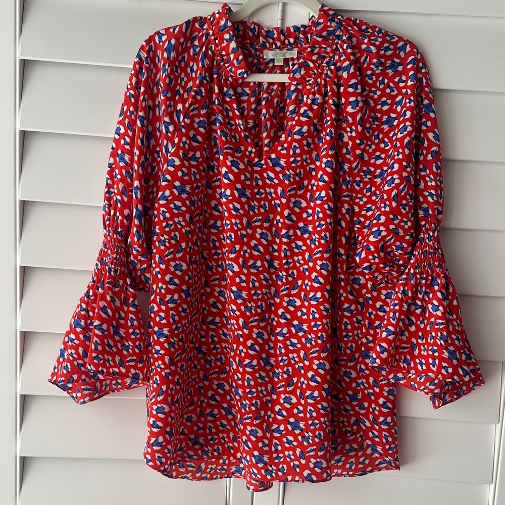 JADE by Melody Tam v-neck tunic top with cinched sleeves. Red white blue print